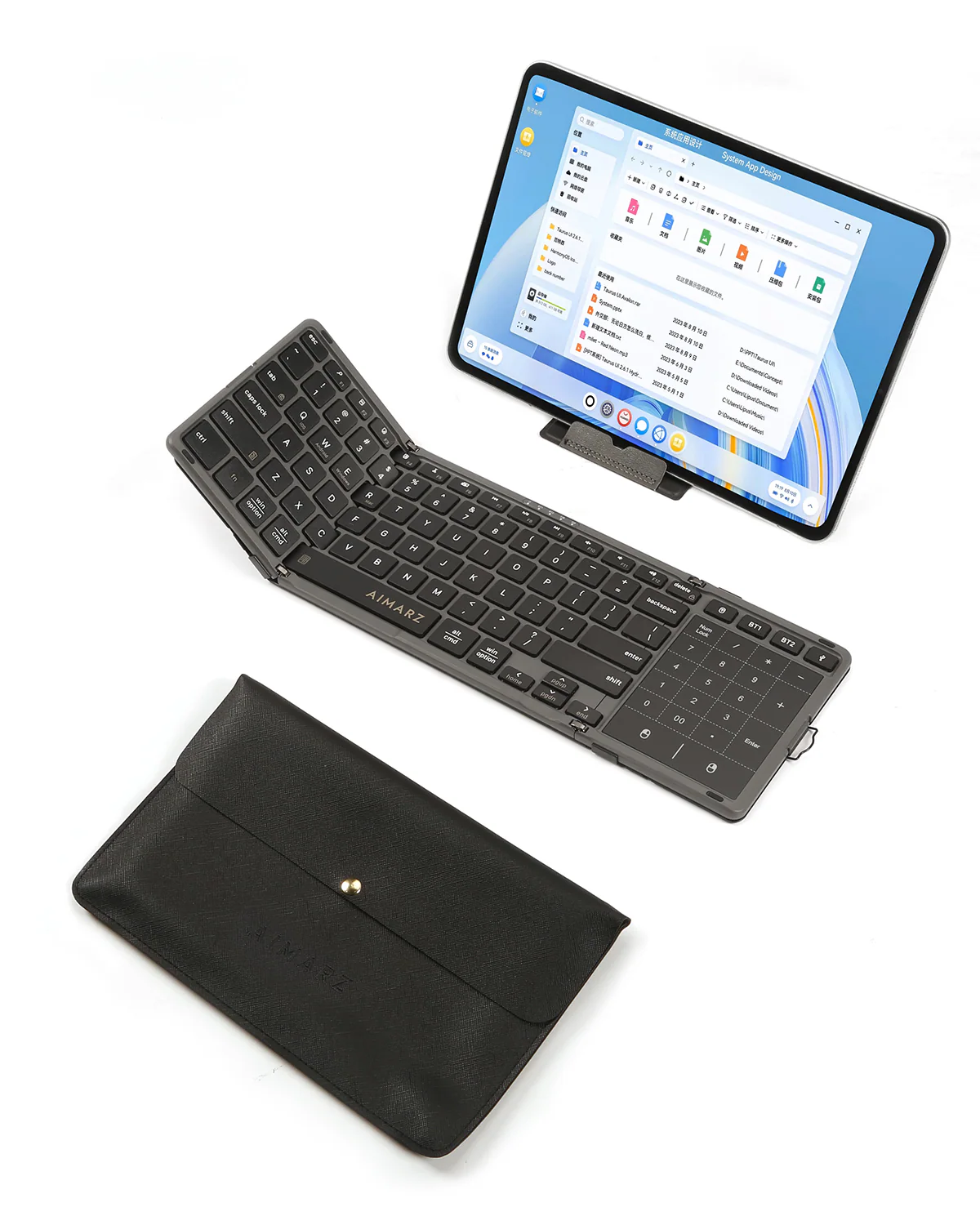 AF01 keyboard open with a tablet on the fold-flat stand and the leather pouch